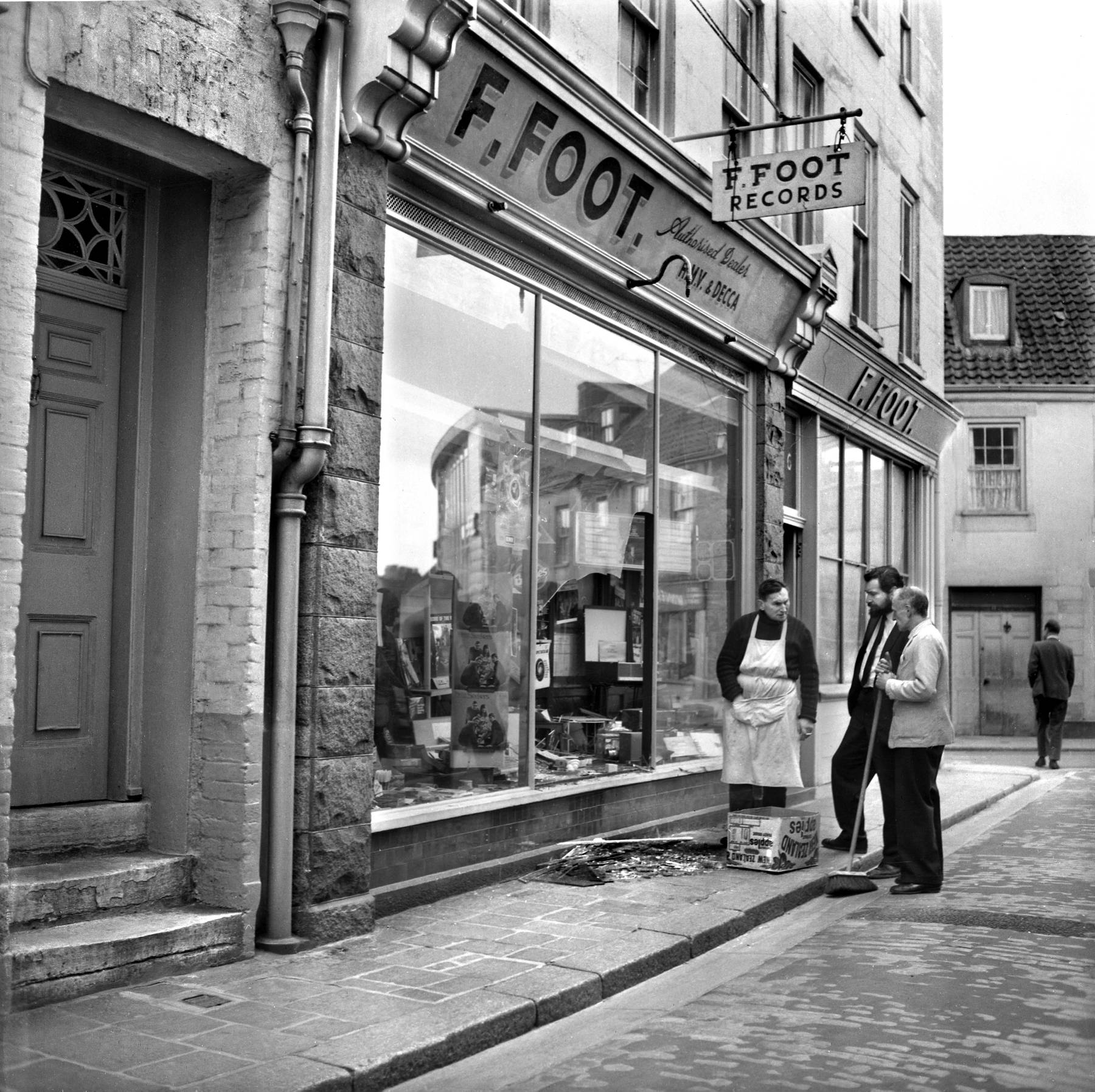 Foot Buildings B&W Photo Front Of Shop (Broken Window)